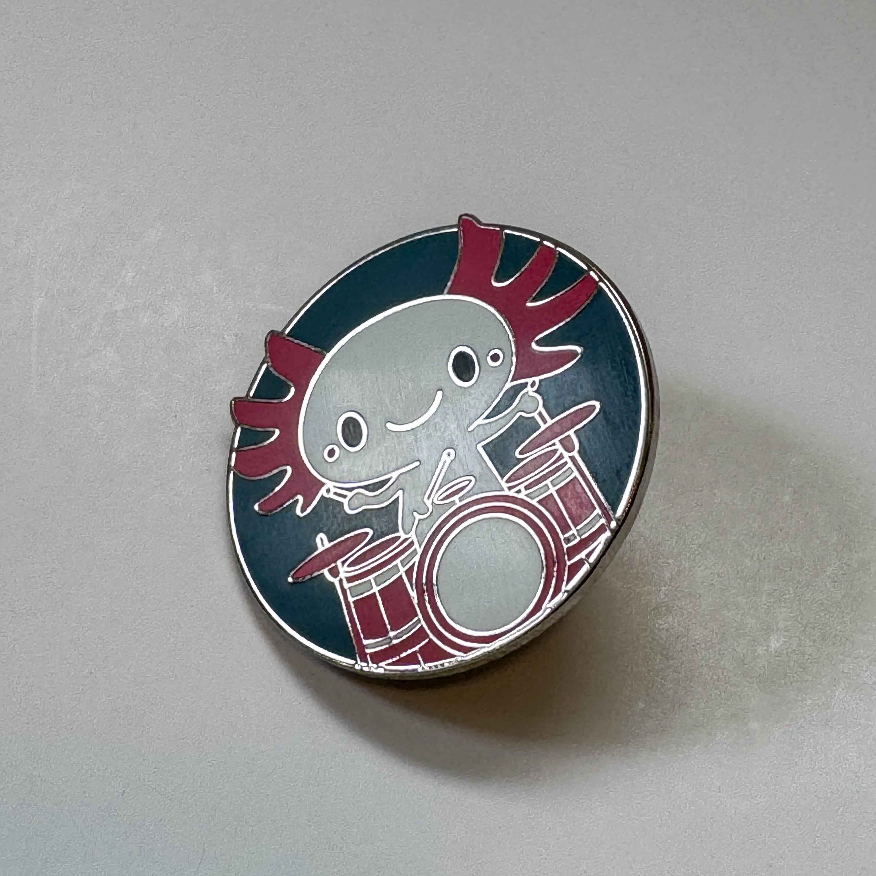 Axolotl with Drums Pin