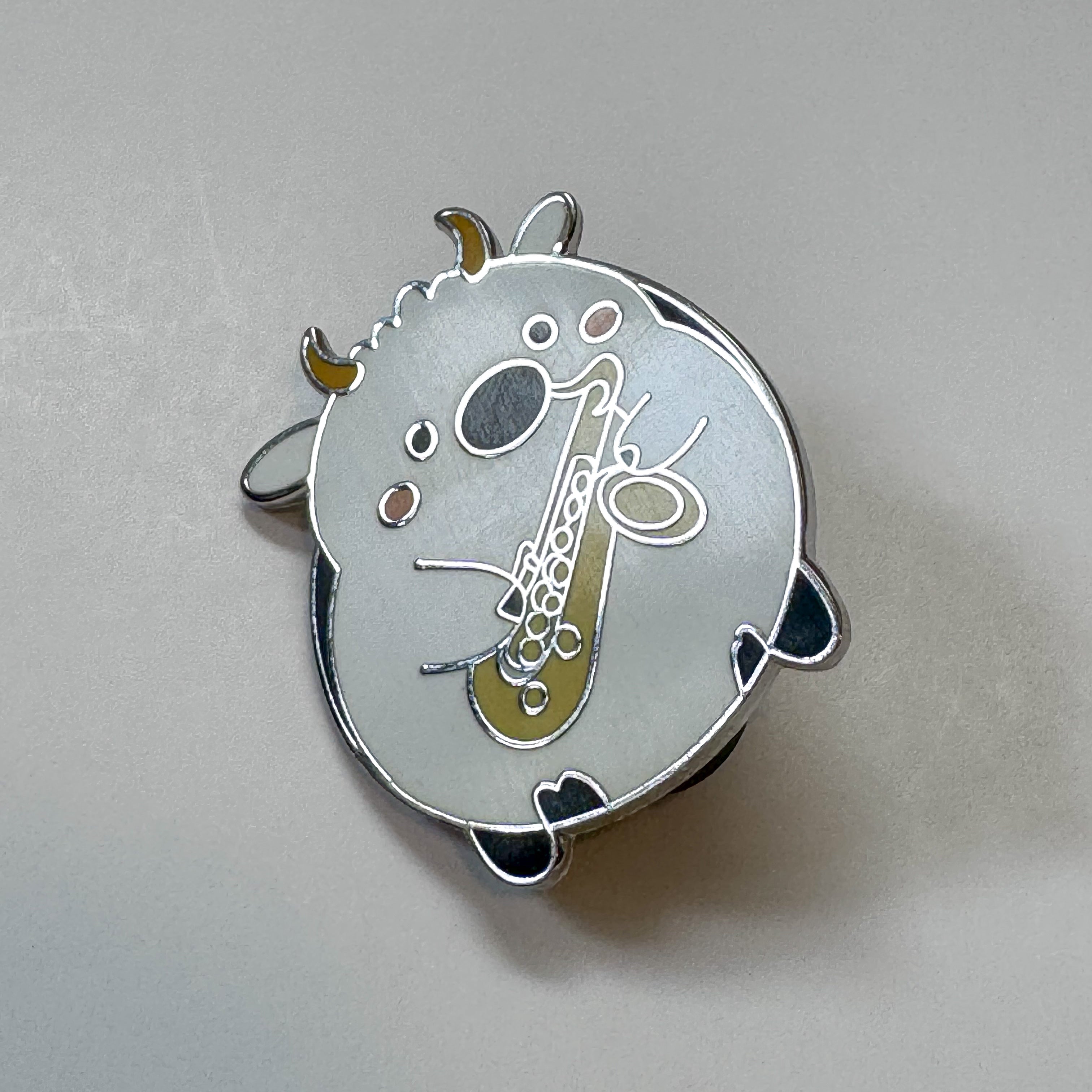 Cow with Saxophone Pin